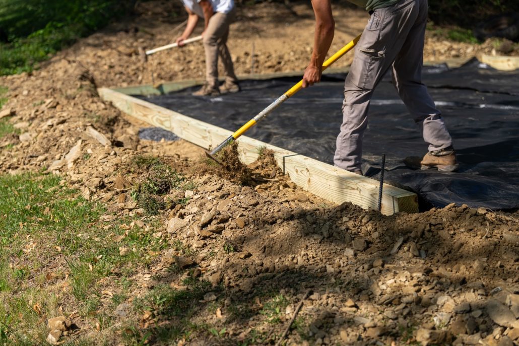 workers moving dirt